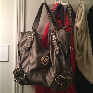 Micheal Kors bronze hand bag